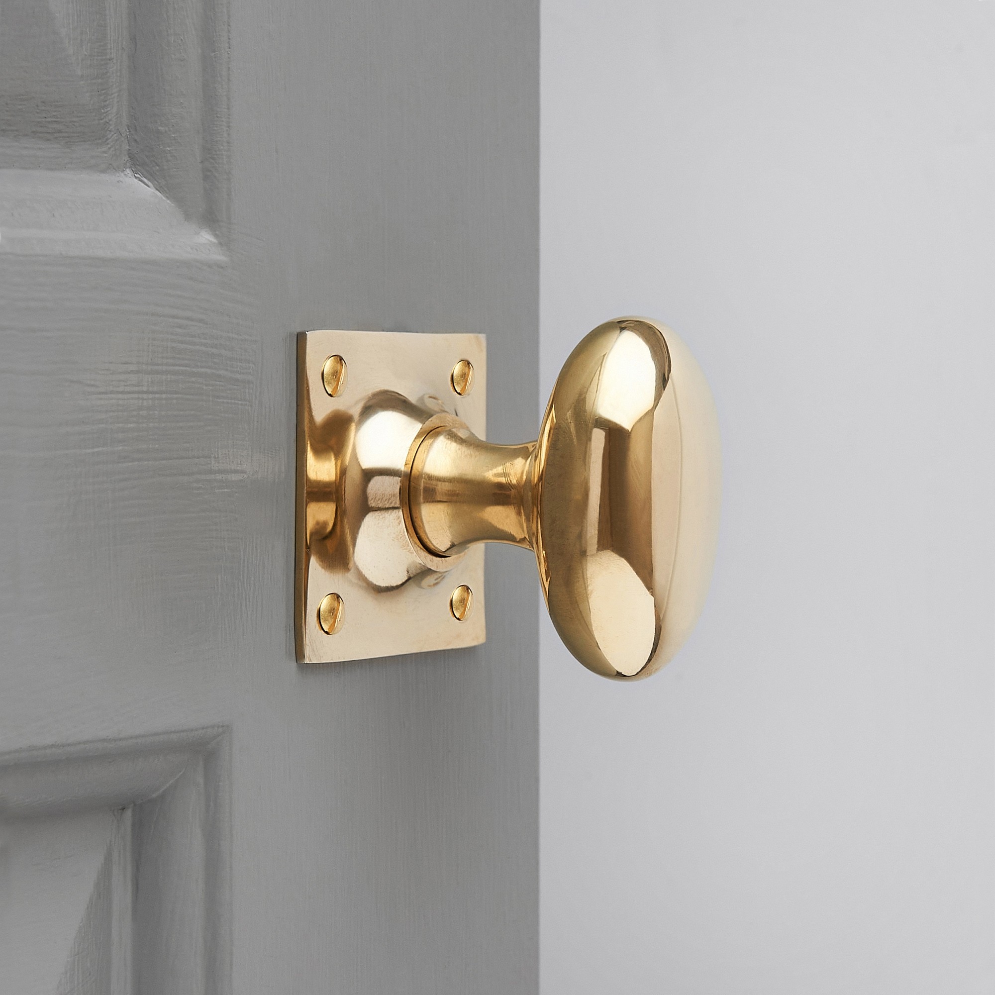 Oval Door Knobs on Square Back Plate (Pair) - Polished Brass