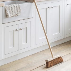 traditional soft broom with wooden handle