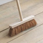 traditional soft broom with wooden handle