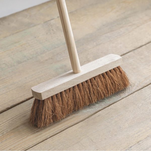 traditional soft broom with wooden handle