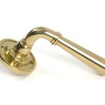 polished brass newbury lever on rose set