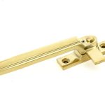 polished brass locking art deco fastener lh