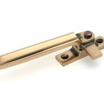 polished bronze locking art deco fastener lh