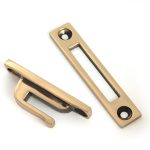 polished bronze locking art deco fastener rh