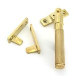 polished brass night vent locking brompton fastener